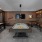billiards and shuffleboard tables in game room