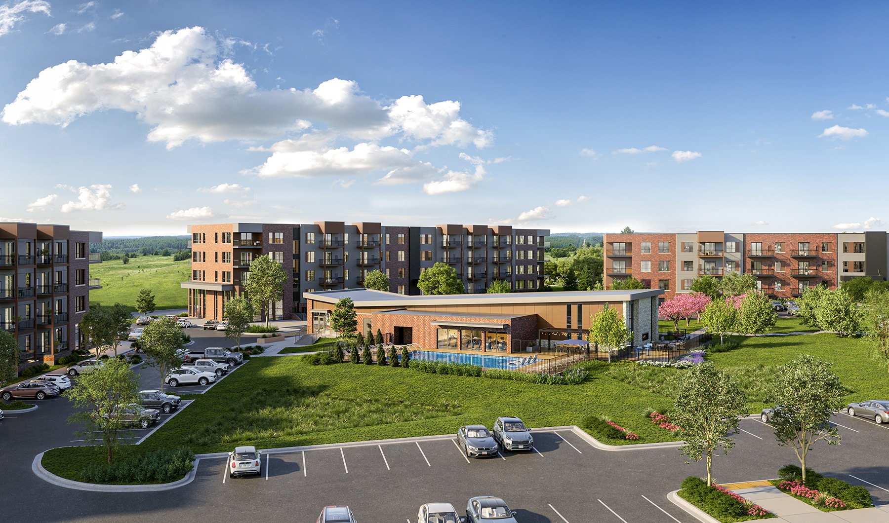 wide view of rendering of building showing lush landscaping and ample parking
